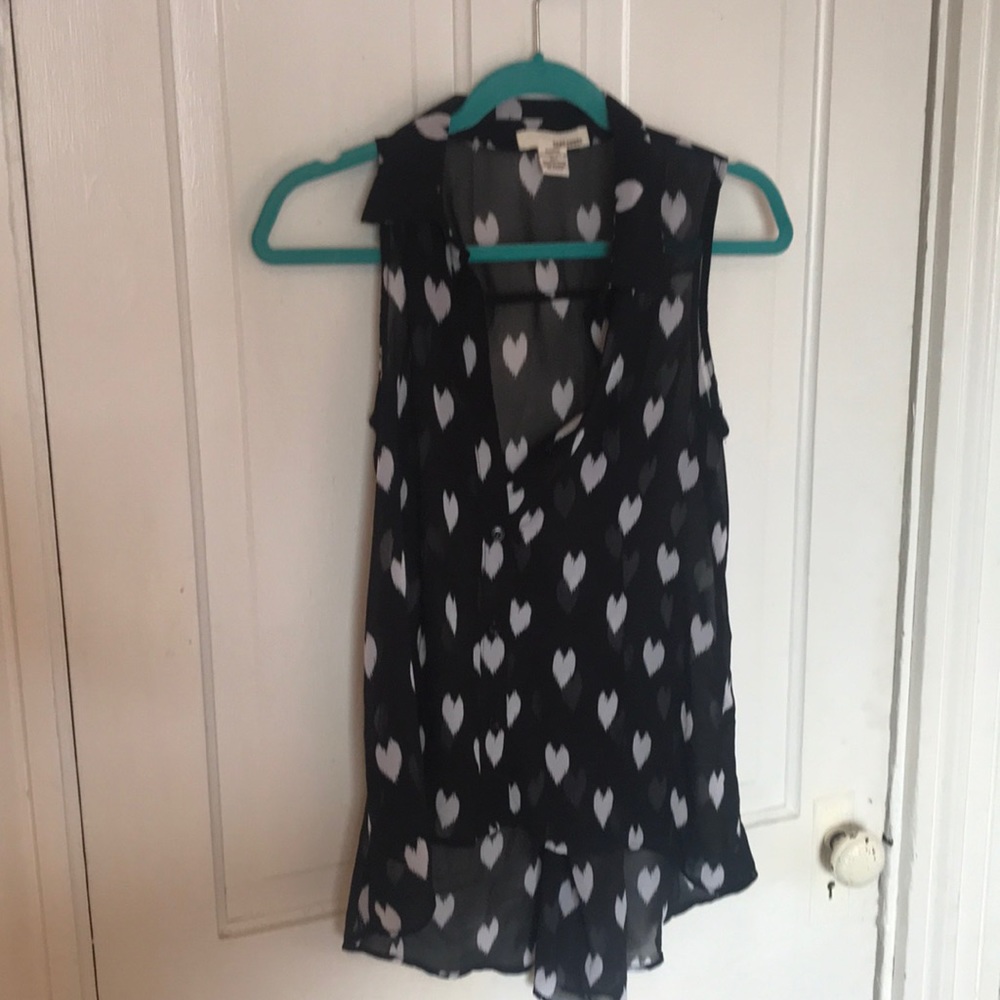 Black dress shirt with white hearts.